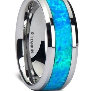 Silver ring with sapphire center